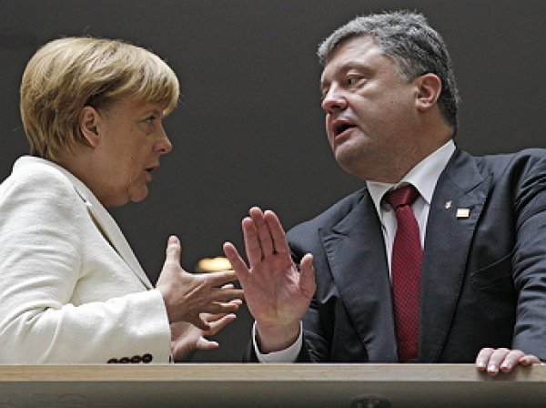 Меркель обратилась к Порошенко после первого тура голосования